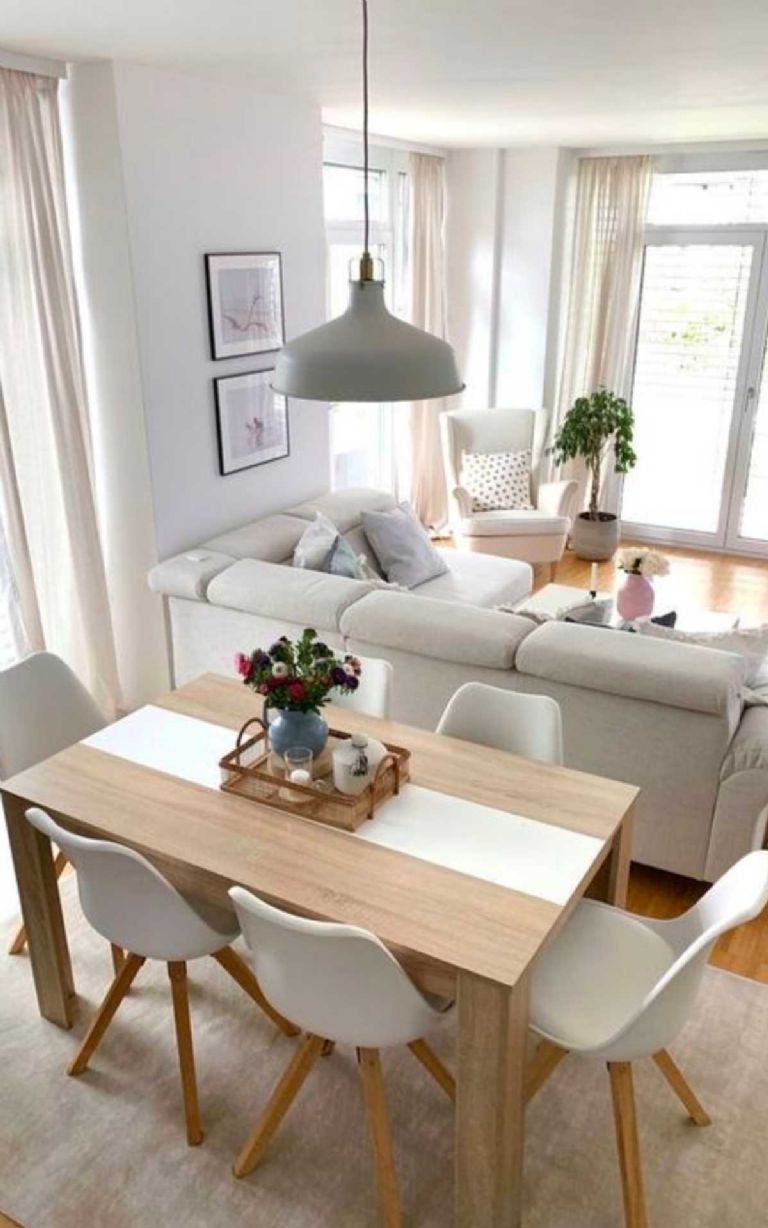 Sala comedor con muebles en tonos gris y detalles en madera